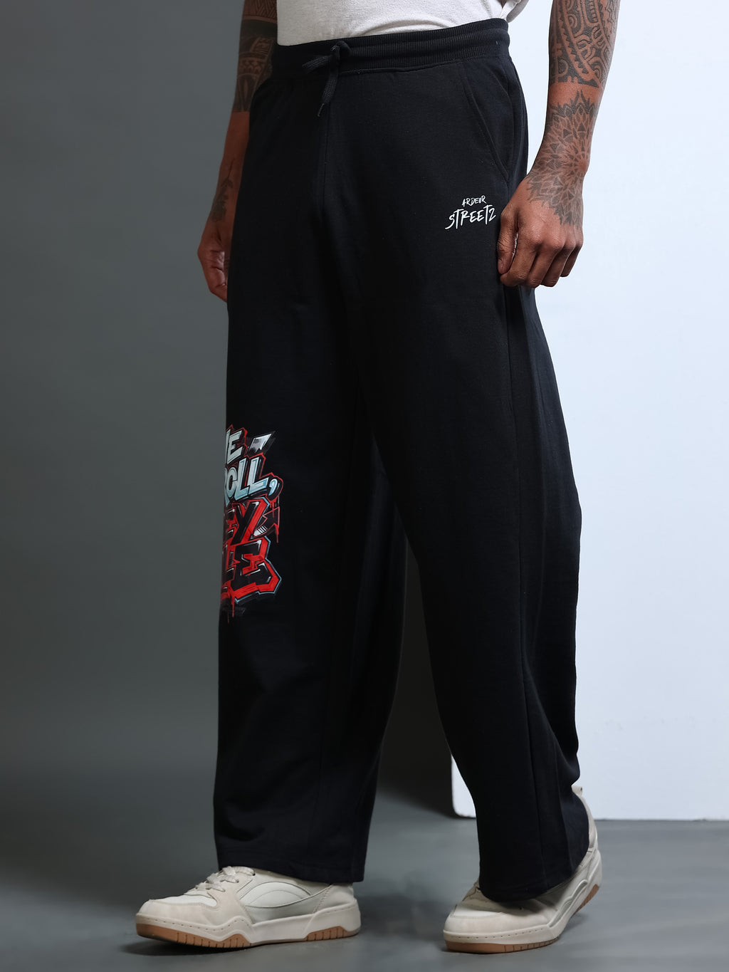 ARDEUR STREETZ Men Black Cotton Blend WE SCROLL THEY RULE Printed Baggy Fit Track Pants