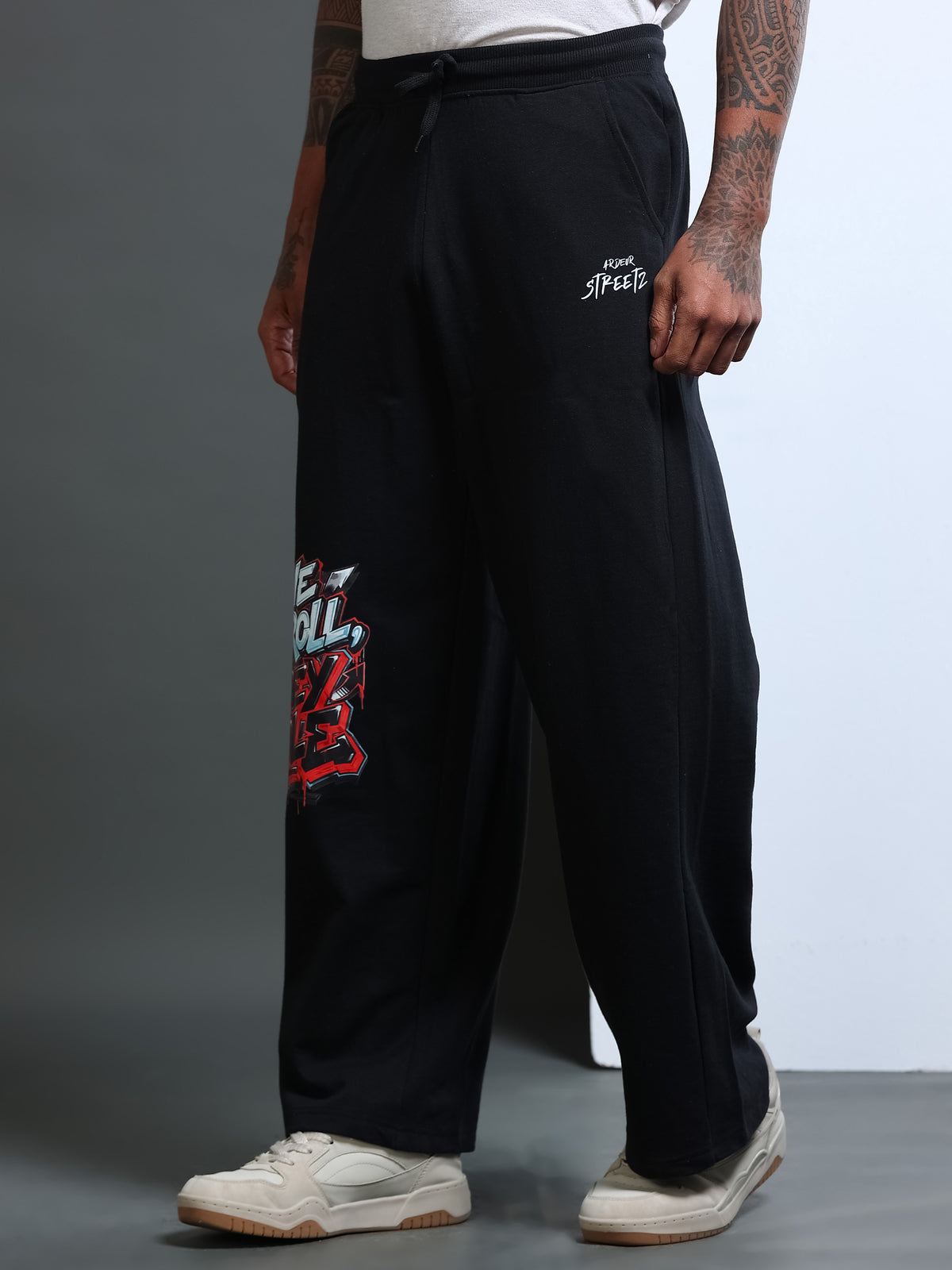 ARDEUR STREETZ Men Black Cotton Blend WE SCROLL THEY RULE Printed Baggy Fit Track Pants