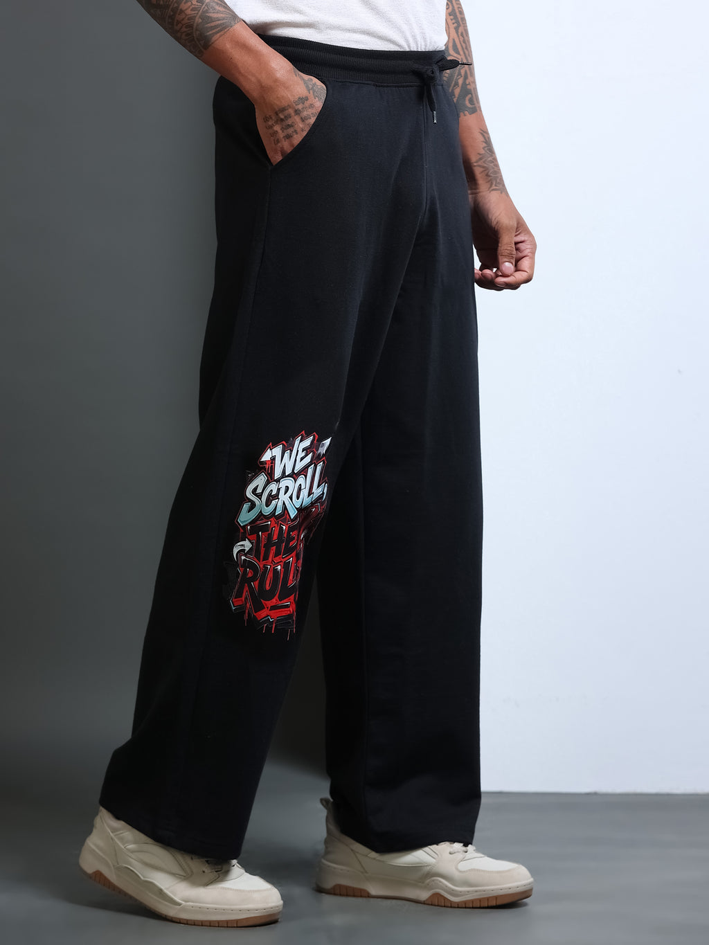 ARDEUR STREETZ Men Black Cotton Blend WE SCROLL THEY RULE Printed Baggy Fit Track Pants