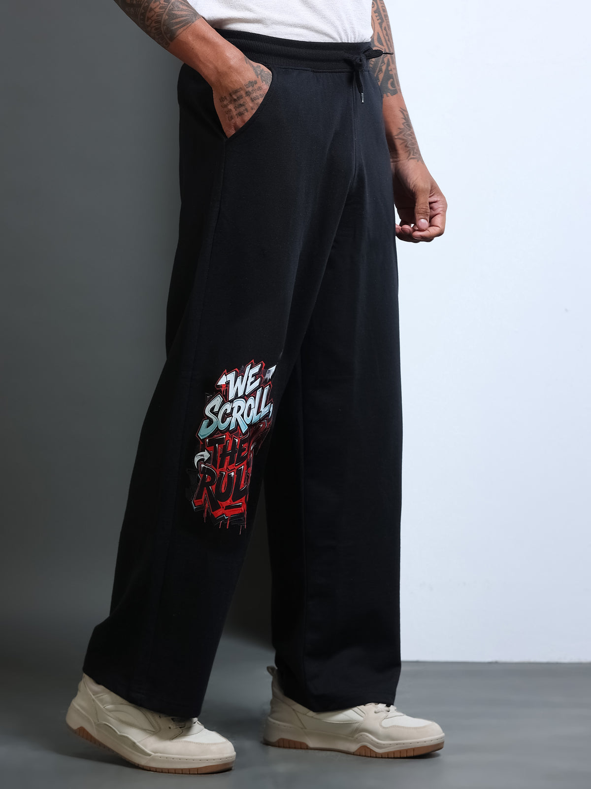 ARDEUR STREETZ Men Black Cotton Blend WE SCROLL THEY RULE Printed Baggy Fit Track Pants