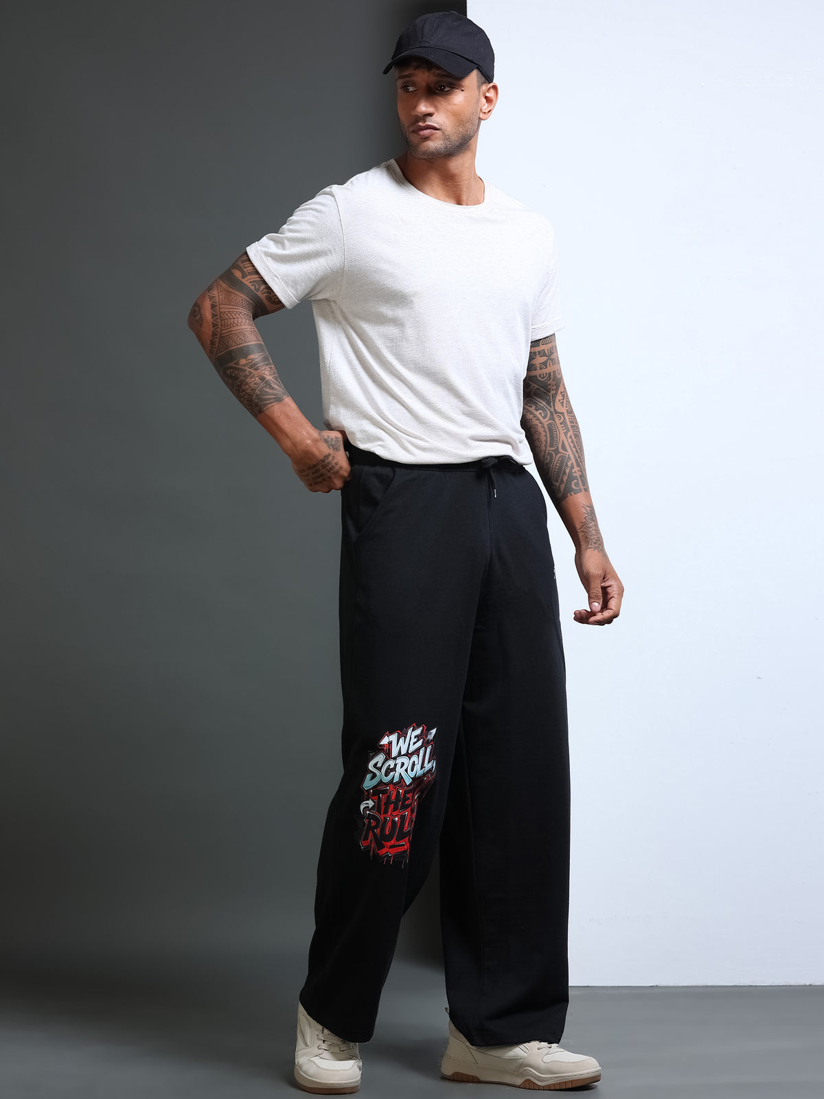 ARDEUR STREETZ Men Black Cotton Blend WE SCROLL THEY RULE Printed Baggy Fit Track Pants