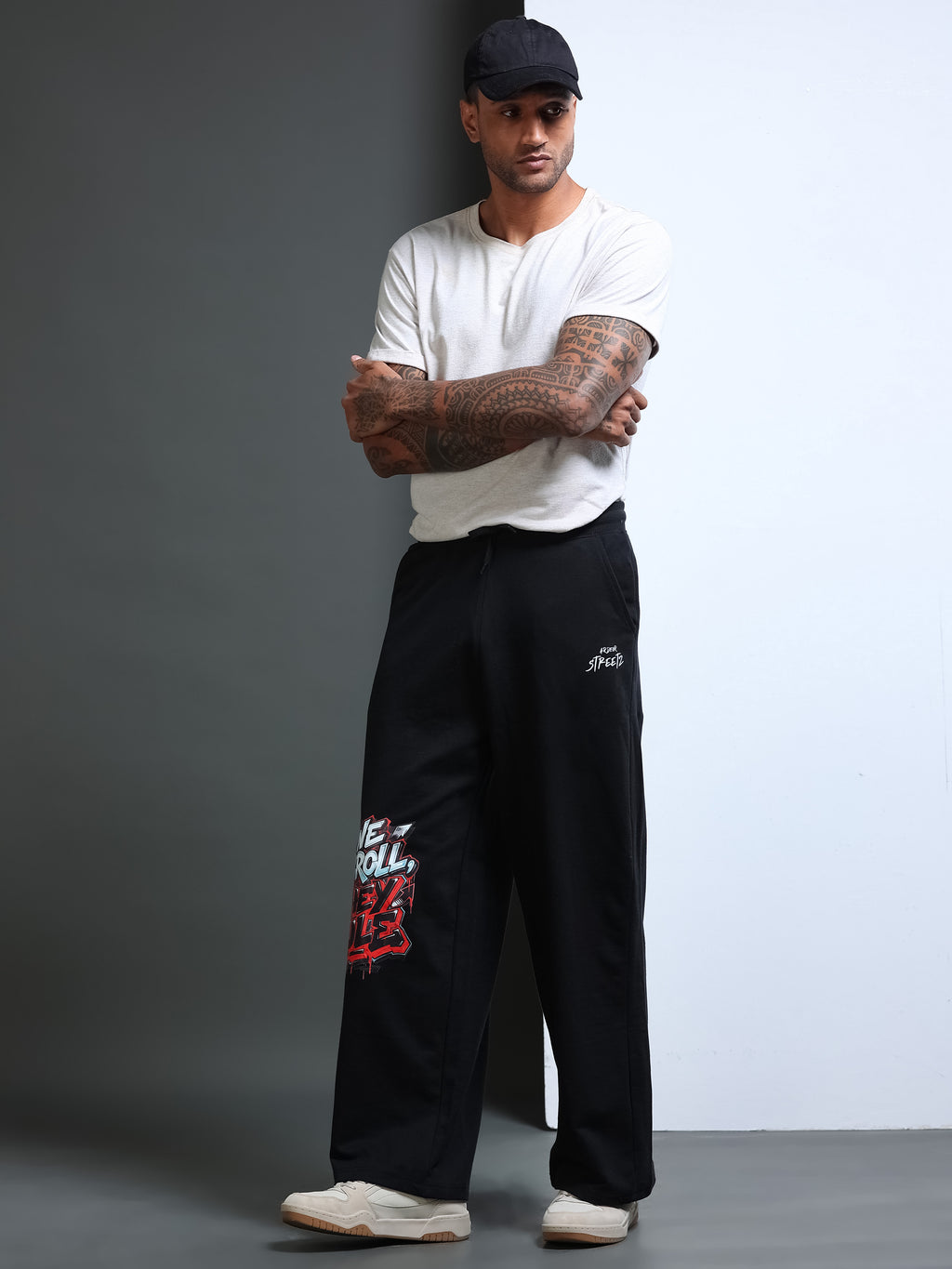 ARDEUR STREETZ Men Black Cotton Blend WE SCROLL THEY RULE Printed Baggy Fit Track Pants