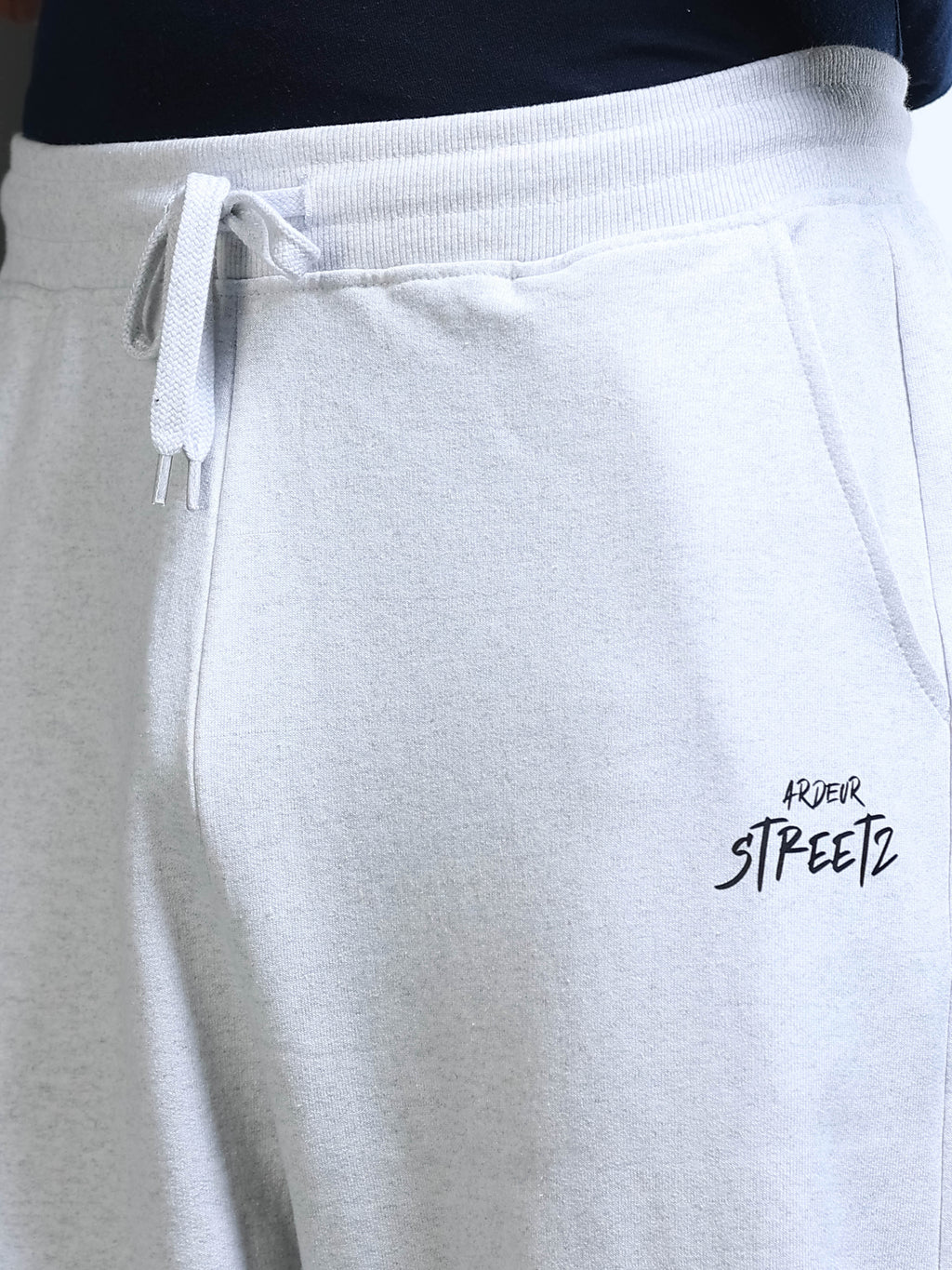 ARDEUR STREETZ Men White Melange Cotton Blend WE SCROLL THEY RULE Printed Baggy Fit Track Pants
