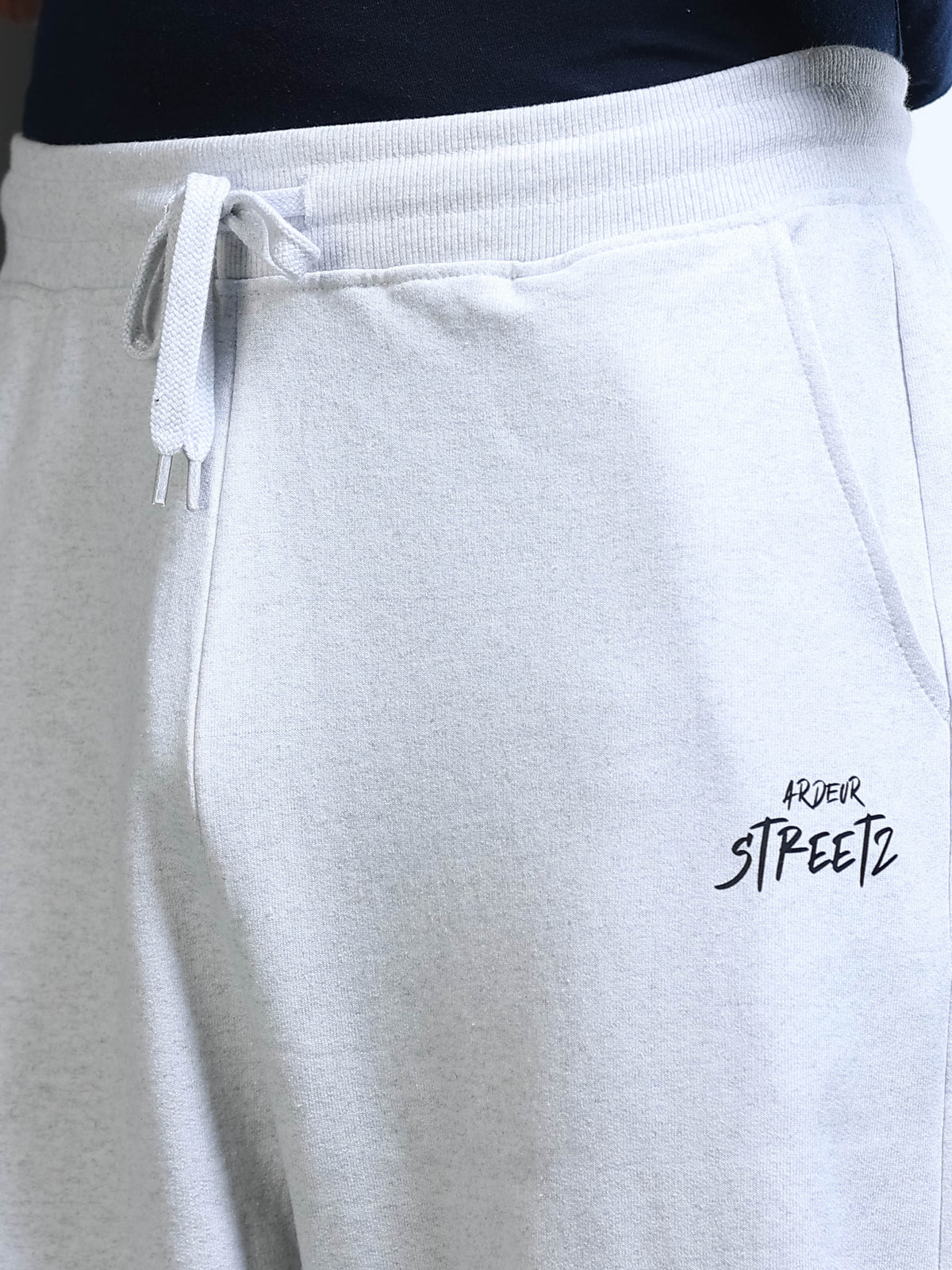 ARDEUR STREETZ Men White Melange Cotton Blend WE SCROLL THEY RULE Printed Baggy Fit Track Pants