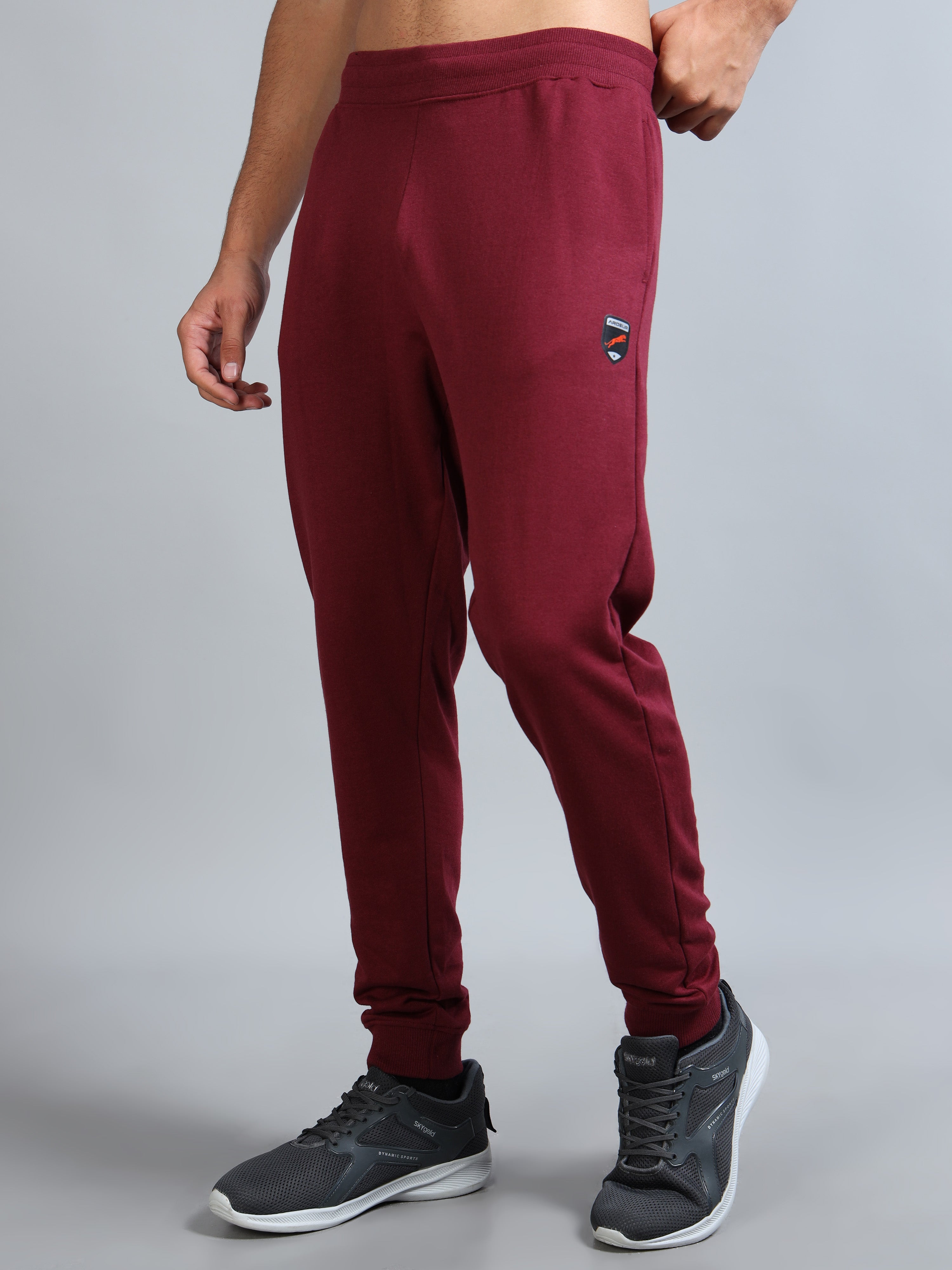 ARDEUR ZEAL IN YOU Men Maroon Self Design Mid-Rise Joggers